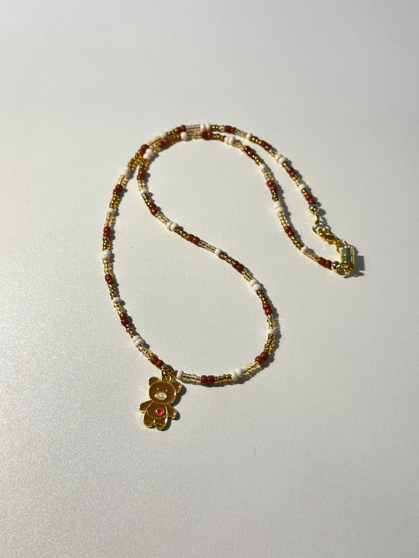 Brown & White Seed Bead Necklace – Brown Bear Enamel Charm, Gold Magnetic Clasp