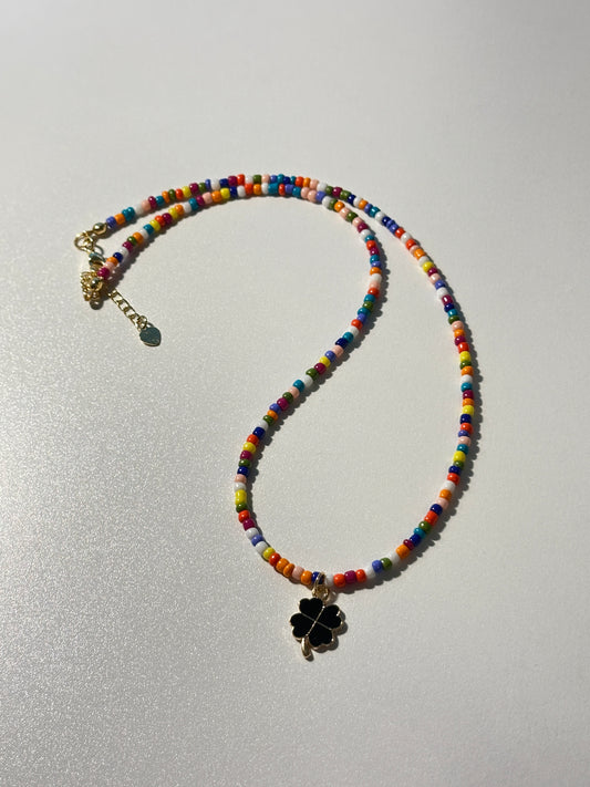 Multicolor Seed Bead Necklace with Black 4 Leaf Clover Enamel Charm